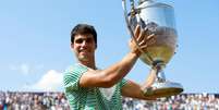 Alcaraz conquista o t&iacute;tulo de Queen's  Foto: Reuters/Peter Cziborra