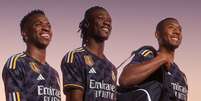 Vini Jr, Camavinga e Alaba posaram com o novo uniforme do Real Madrid para a temporada 2023/24 –  Foto: Divulgação/Real Madrid / Jogada10