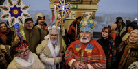 Muitos ucranianos, como essas pessoas em Kiev, comemoraram o último Natal em abrigos em meio a contínuos ataques russos  Foto: EPA-EFE/REX/SHUTTERSTOCK / BBC News Brasil