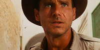 Indiana Jones (Harrison Ford) em "Os Caçadores da Arca Perdida" (1981)  Foto: reprodução / Os Caçadores da Arca Perdida / Flipar