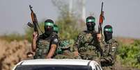 Combatentes palestinos da ala militar do Hamas  Foto: Getty Images / BBC News Brasil