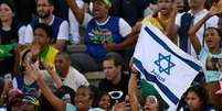 Bandeira de Israel durante "Marcha para Jesus"  Foto: AFP via Getty Images / BBC News Brasil