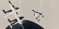 O porta-avi&otilde;es VMS Eve e o avi&atilde;o espacial VSS Unity, usados pela Virgin Galactic em seus voos tur&iacute;sticos (Imagem: Reprodu&ccedil;&atilde;o/Spaceport America)  Foto: Canaltech