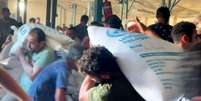 Segundo UNRWA, saques em armazéns são "sinal preocupante de que a ordem civil está começando a ruir" em Gaza.  Foto: AFP / BBC News Brasil