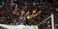 Felipe Melo e Cano comemoram título do Fluminense   Foto: Sergio Moraes / Reuters