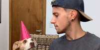 Influenciador Matheus Rocha com sua cadela  Foto: 