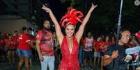 Viviane Araújo apostou em maiô vermelho decorado e valorizou pernas definidas em look para 1º ensaio de rua do Salgueiro para o carnaval 2024. Foto: AGNews, Anderson Borde / Purepeople