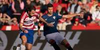  Foto: Jorge Guerrero/AFP via Getty Images - Legenda: Granada x Athletic Bilbao: duelo continuará nesta segunda-feira / Jogada10