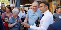 O presidente francês Macron disse no passado que bebe vinho duas vezes por dia  Foto: LUDOVIC MARIN/POOL/AFP / BBC News Brasil