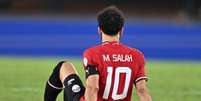 Franck Fife /AFP via Getty Images - Legenda: Salah em a&ccedil;&atilde;o pelo Egito na Copa Africana de Na&ccedil;&otilde;es  Foto: Jogada10