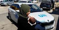 Agência da ONU dá assistência humanitária a palestinos  Foto: Reuters / BBC News Brasil