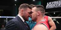 McGregor e Chandler se encarando no TUF   Foto: Divulga&ccedil;&atilde;o/Twitter The Ultimate Fighter / Esporte News Mundo