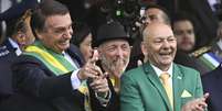 Jair Bolsonaro e Luciano Hang  Foto: Reprodução/Getty Images