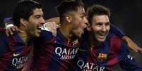 Trio MSN comemorando um gol do Barcelona (LLUIS GENE/AFP)  Foto: Esporte News Mundo