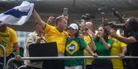 Jair e Michelle Bolsonaro durante ato na Avenida Paulista   Foto: Taba Benedicto / Estadão