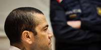  Foto: Jordi Borras/Pool/AFP - Legenda: Daniel Alves foi condenado na última semana / Jogada10