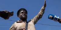 Jimmy "Barbecue" Ch&eacute;rizier se torou o principal l&iacute;der da gangue conhecida como G9 e Fam&iacute;lia  Foto: Reuters / BBC News Brasil