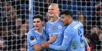  Foto: Oli Scarff/AFP via Getty Images - Legenda: Erling Haaland comemora o gol marcado na vitória sobre o Copenhagen - / Jogada10