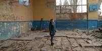 Moradores da regi&atilde;o de Donetsk, como Mariya, organizam-se para fugir das for&ccedil;as russas, cada vez mais pr&oacute;ximas  Foto: BBC/XAVIER VANPEVENAEGE / BBC News Brasil