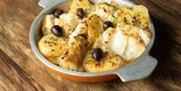 Bacalhau com batata e azeitona  Foto: Gayvoronskaya_Yana | Shutterstock / Portal EdiCase