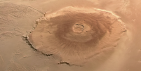Olympus Mons, o maior vulc&atilde;o do Sistem Solar (Imagem: Reprodu&ccedil;&atilde;o/ESA, DLR, FU Berlin, Mars Express/Andrea Luck)  Foto: Canaltech