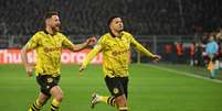  Foto: Ina Fassbender/AFP via Getty Images - Legenda: Sancho marca o gol da classificação do Borussia Dortmund / Jogada10