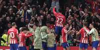 Jogadores do Atlético de Madrid comemorando a classificação.   Foto: THOMAS COEX/AFP via Getty Images / Esporte News Mundo