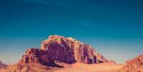 A aridez e as formações rochosas do Wadi Rum, na Jordânia, dão vida ao planeta Arrakis  Foto: Rita/Unsplash / Viagem e Turismo