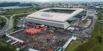  Foto: Divulgação/Corinthians - Legenda: Neo Química Arena é razão de dívida milionária corintiana / Jogada10