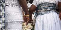 Casamento de religião de matriz africana   Foto: Thales Antonio/iStock 