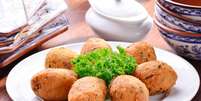 Bolinhos de bacalhau  Foto: Marcelo Cabral/Divulga&ccedil;&atilde;o / Estad&atilde;o