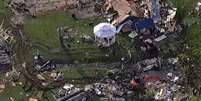 Destroços espalhados por uma propriedade no dia posterior a uma série de tornados no Texas, EUA   Foto: Reprodução/Reuters