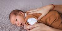 Como fazer Manobra de Heimlich em bebês? Foto: Dobrila Vignjevic/Getty Images