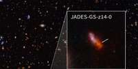 JADES-GS-z14-0 é quase imperceptível na imagem do Webb, mas tem 1.600 anos-luz de diâmetro (Imagem: Reprodução/NASA/CSA/STScI/B. Robertson/B. Johnson/S. Tacchella/P. Cargile)  Foto: Canaltech