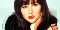 Shannen Doherty como Brenda, a doce garota do interior que tentava se encontrar entre os ricos de Beverly Hills em 'Barrados no Baile'  Foto: Reprodução