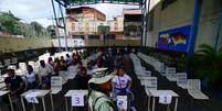 Pessoas votando para a eleição presidencial em Caracas, na Venezuela Foto: REUTERS/Maxwell Briceno