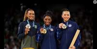 Rebeca Andrade, Simone Biles e Sunisa Lee formaram o pódio individual geral da Ginástica Artística nas Olimpíadas de Paris 2024. Foto: Getty Images, Jamie Squire / Purepeople