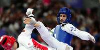 Edival Pontes conquistou a medalha de bronze ao vencer o espanhol Javier Pérez Polo.  Foto: Getty Images