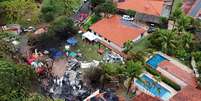 Peritos trabalham no local da queda de avião em Vinhedo, SP (10/08/2024)  Foto: REUTERS/Carla Carniel