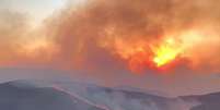 O incêndio no Parque Nacional da Serra do Cipó, localizado na Região Central de Minas Gerais, entrou no seu terceiro dia  Foto: Reprodução / Redes Sociais / Perfil Brasil