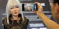 Um robô humanoide desenvolvido pela Ex-Robots pisca na Conferência Mundial de Robôs em Pequim, China, em 21 de agosto de 2024.  Foto: REUTERS/Florence Lo/Arquivo Foto