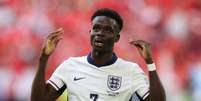 Bukayo Saka, em ação pela Inglaterra  Foto: Adrian DENNIS / AFP / Lance!