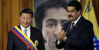 Xi Jinping e Nicolás Maduro, em imagem de 2014. A China apoiou de diversas formas o governo venezuelano nos últimos anos.  Foto: Getty Images / BBC News Brasil