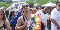 Fãs enfrentam forte calor na Cidade do Rock neste domingo, 22  Foto: Estadão Conteúdo