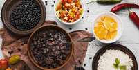 Feijoada: aprenda a fazer prato tradicional e saboroso  Foto: Freepik