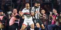  Foto: Vitor Silva/Botafogo - Legenda: Lucas Moura em ação pelo São Paulo contra o Botafogo / Jogada10