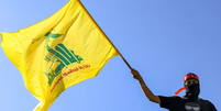 Hezbollah é um partido político xiita e um grupo armado com forte influência no Líbano, tanto no parlamento quanto no governo  Foto: Getty Images / BBC News Brasil