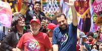 Lula durante caminhada na Avenida Paulista ao lado de Boulos neste sábado, 5  Foto: YURI MURAKAMI/FOTOARENA/ESTADÃO CONTEÚDO