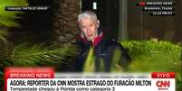Anderson Copper lutou contra o vento e chuva para fazer o 'ao vivo' na CNN  Foto: Reprodu&ccedil;&atilde;o/TV