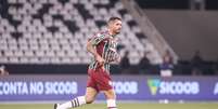 - Foto: Lucas Merçon/Fluminense - Legenda: Renato Augusto em ação com a camisa do Fluminense / Jogada10